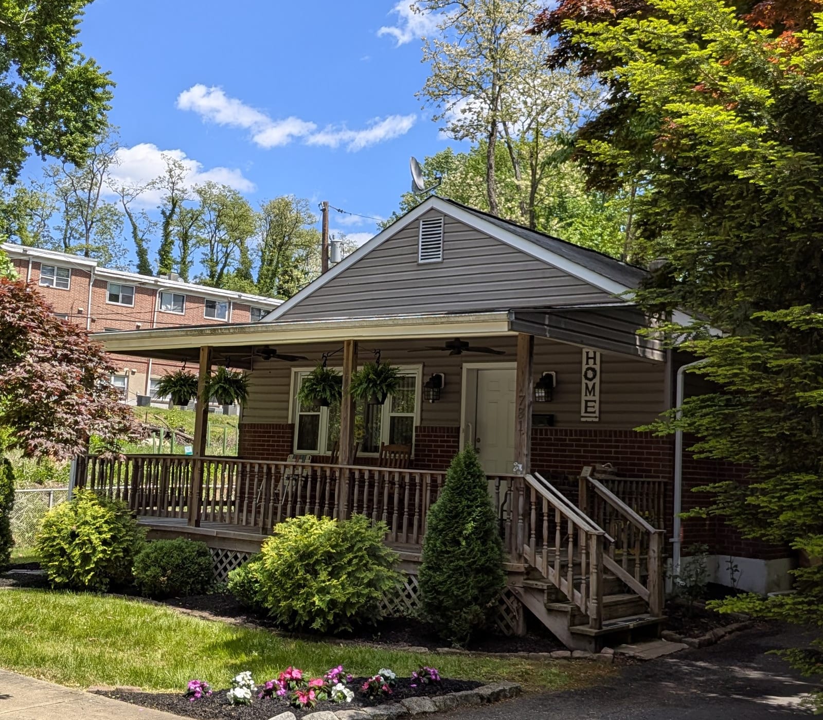 The front porch of A Good Life Assisted Living on a sunny spring day